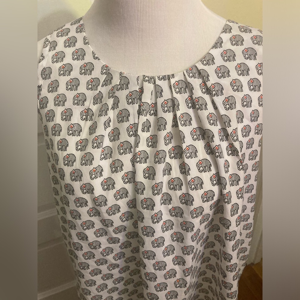 Sleeveless blouse with elephant design